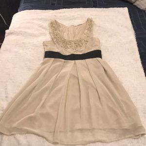 Worn once—-cute cream dress with black belt